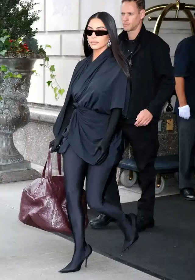 Kim Kardashian Black Ensemble with Shaggy Balenciaga Coat